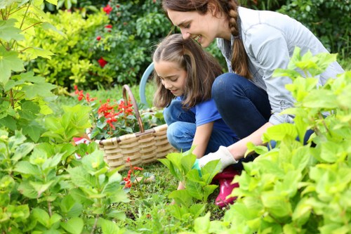 Team of gardeners maintaining a vibrant Enfield garden